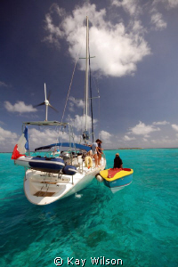 Tobago Cays, vendor and yachties! by Kay Wilson 